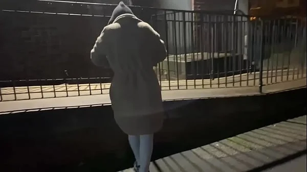 Woman on street gets offered a cigarette to flash and piss in public