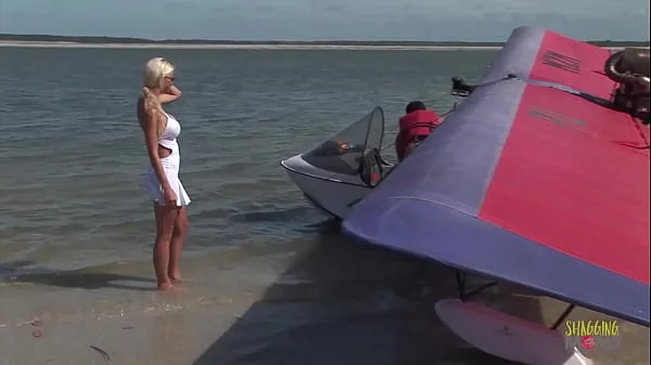 Passionate fucking on the beach with a stunning blonde with big tits