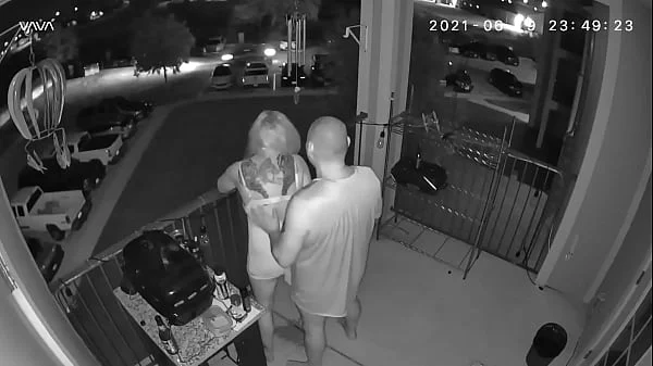 Couple caught on the balcony