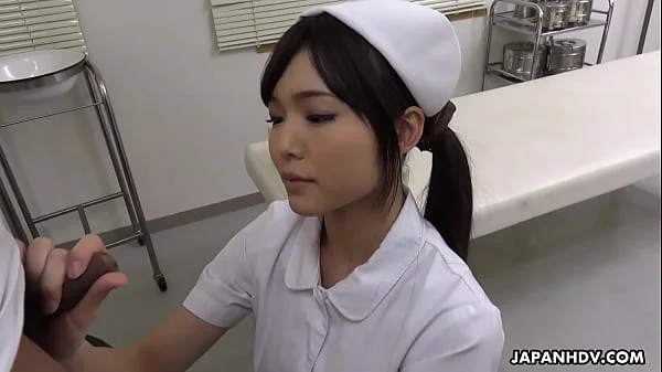 Japanese nurse Shino Aoi blows a patient's dick in the doctor's office uncensored.