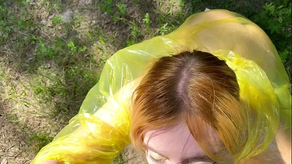 b. in pvc raincoat sucks an swallow dick