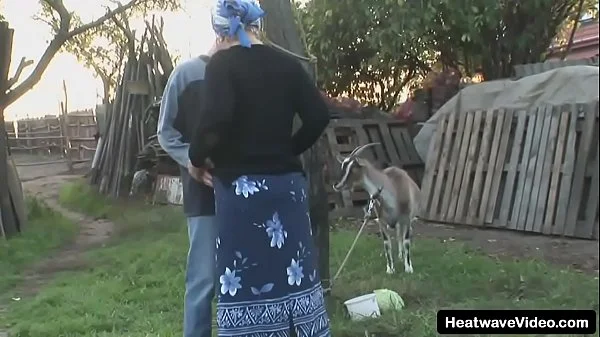 Pervert granny gets banged by a much y. man right in the middle of the backyard