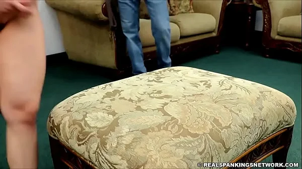 Kenzie gets spanked on the ottoman