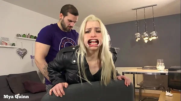 Mya wearing Levi's jeans and leather jacket and gets fucked through hole, piss on clothes, mouth gag deepthroat